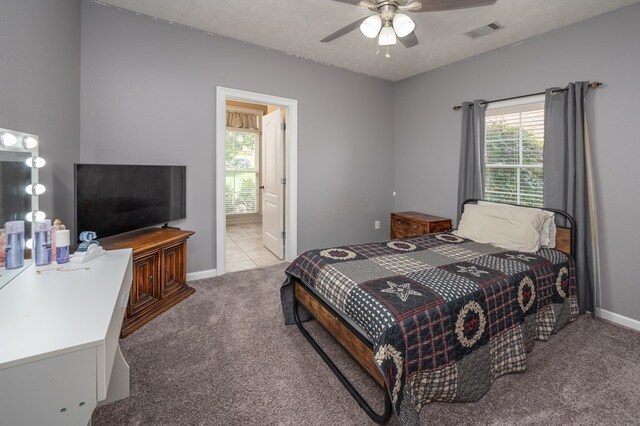 7036 Imperial Way, Columbus, GA 31904 - bedroom with carpet, ensuite bathroom, and a ceiling fan