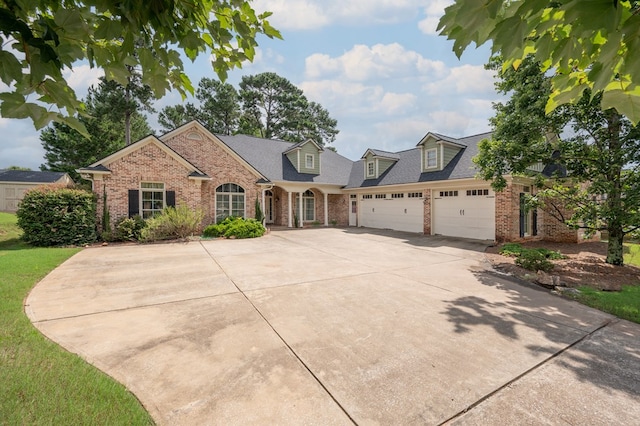 7036 Imperial Way, Columbus, GA 31904 - view of front of house featuring brick siding, driveway, and an attached garage