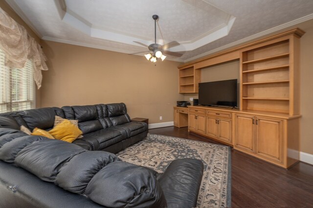 7036 Imperial Way, Columbus, GA 31904 - living room with a raised ceiling, dark wood finished floors, ceiling fan, and crown molding