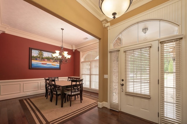7036 Imperial Way, Columbus, GA 31904 - dining room with crown molding, dark wood-style floors, and a chandelier