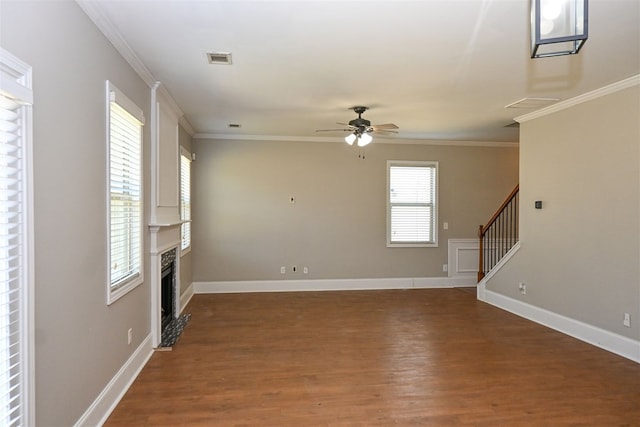 4447 Walking Stick Way, Columbus, GA 31907 - unfurnished living room featuring a ceiling fan, wood finished floors, a fireplace, crown molding, and stairs