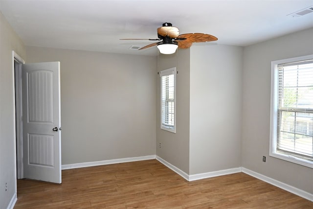 4447 Walking Stick Way, Columbus, GA 31907 - empty room featuring healthy amount of natural light, light wood finished floors, and ceiling fan