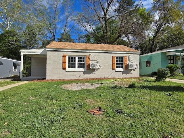 view of front of home with a front lawn