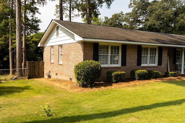 4042 Lyn Dr, Columbus, GA 31909 - view of side of home with crawl space, brick siding, and roof with shingles