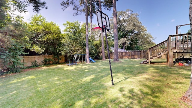 4042 Lyn Dr, Columbus, GA 31909 - fenced backyard with stairway and a playground