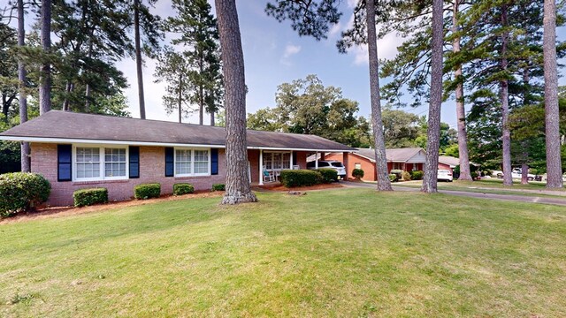 4042 Lyn Dr, Columbus, GA 31909 - ranch-style home with a front yard, brick siding, and driveway
