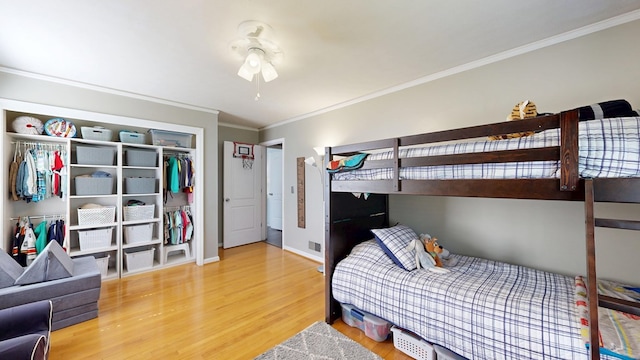4042 Lyn Dr, Columbus, GA 31909 - bedroom featuring wood finished floors, crown molding, and a closet