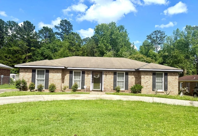 300 Jefferson Dr, Columbus, GA 31907 - ranch-style house featuring a front yard and brick siding