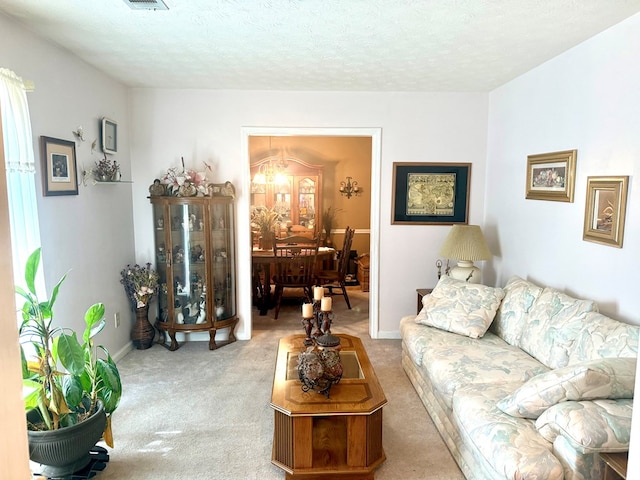 300 Jefferson Dr, Columbus, GA 31907 - carpeted living room with a textured ceiling