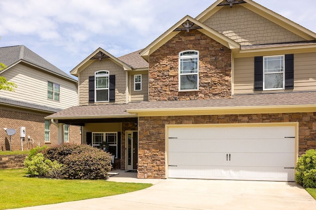 craftsman inspired home with stone siding, a garage, roof with shingles, driveway, and a front lawn