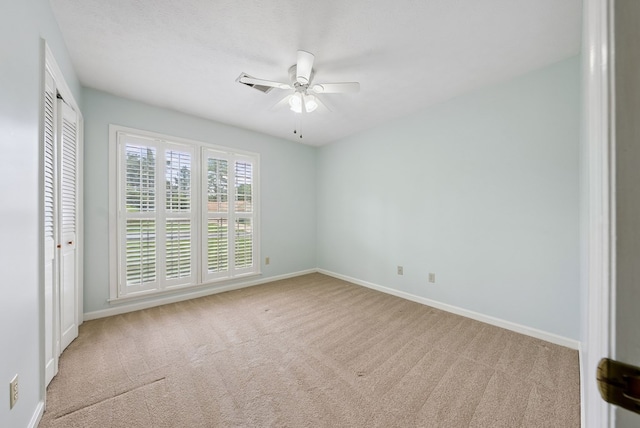 1818 Springvalley Dr, Columbus, GA 31904 - unfurnished bedroom with carpet floors, a closet, and a ceiling fan