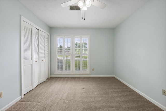 1818 Springvalley Dr, Columbus, GA 31904 - unfurnished bedroom with carpet flooring, a closet, and a ceiling fan