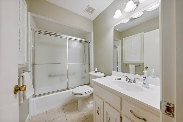 1818 Springvalley Dr, Columbus, GA 31904 - bathroom with vanity, tile patterned floors, and combined bath / shower with glass door