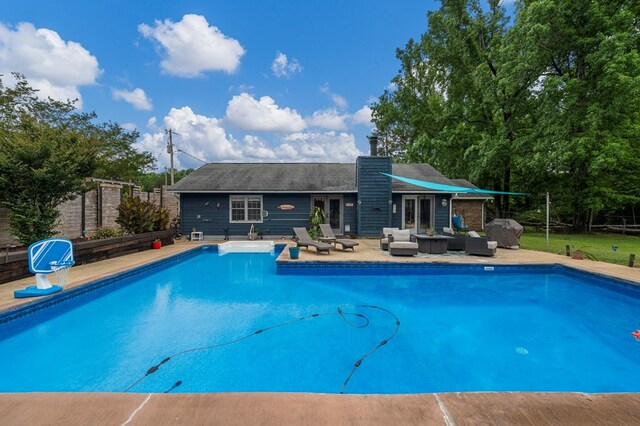3264 Columbus Hwy, Box Springs, GA 31801 - view of pool featuring an outdoor living space, a fenced backyard, and a patio