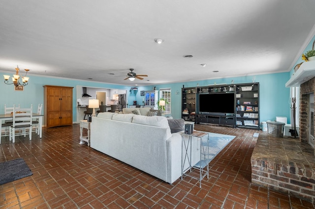 3264 Columbus Hwy, Box Springs, GA 31801 - living area featuring brick flooring, a ceiling fan, ornamental molding, a chandelier, and a brick fireplace