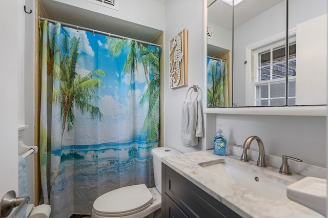 3264 Columbus Hwy, Box Springs, GA 31801 - bathroom with toilet, vanity, and a shower with curtain
