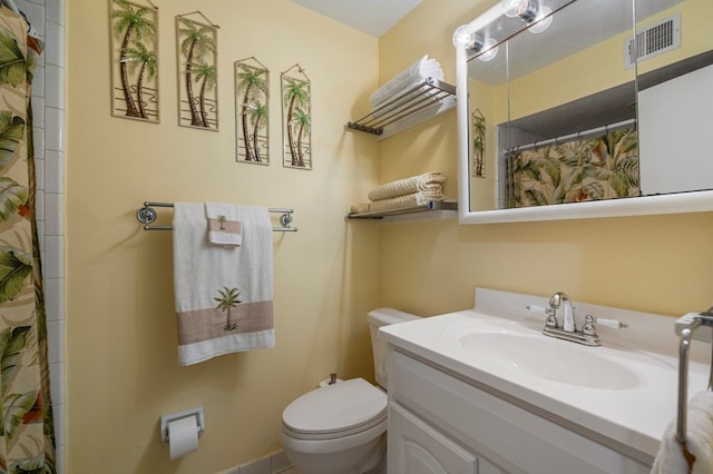 3264 Columbus Hwy, Box Springs, GA 31801 - full bathroom featuring vanity, toilet, and a shower with curtain