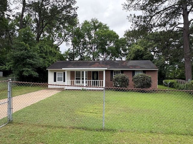single story home featuring covered porch and brick siding