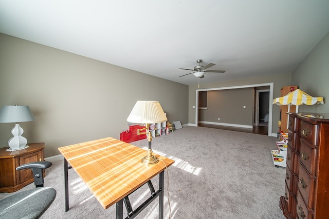 interior space with ceiling fan