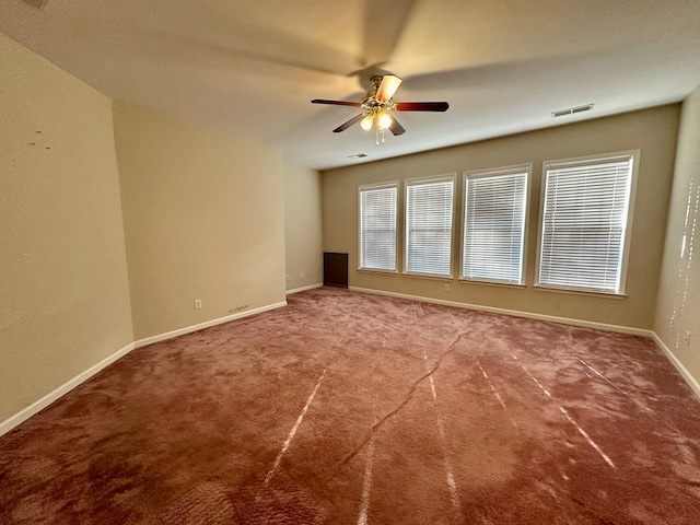 unfurnished room featuring carpet flooring and ceiling fan