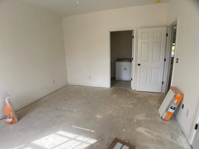2459 Brownie Ln, Columbus, GA 31903 - unfurnished bedroom with concrete floors and baseboards