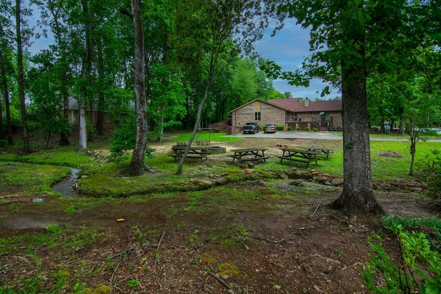 4200 Bridgecrest Dr Unit E4, Phenix City, AL 36867 - view of yard featuring a deck