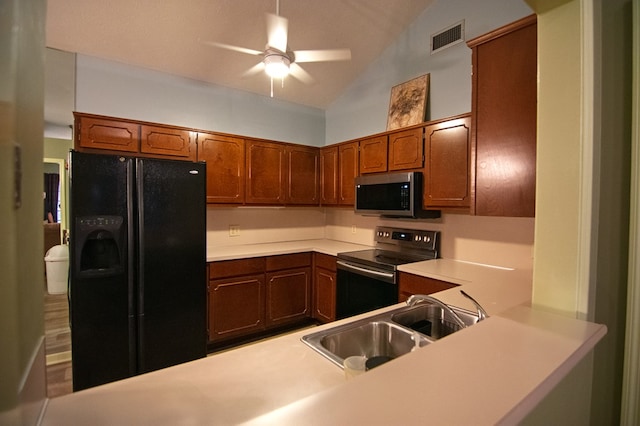 4200 Bridgecrest Dr Unit E4, Phenix City, AL 36867 - kitchen with appliances with stainless steel finishes, lofted ceiling, a sink, a ceiling fan, and light countertops
