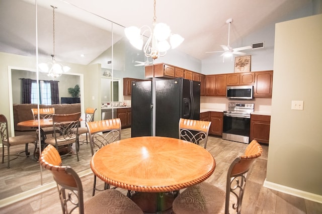 4200 Bridgecrest Dr Unit E4, Phenix City, AL 36867 - dining area featuring a chandelier, light wood finished floors, a ceiling fan, high vaulted ceiling, and baseboards