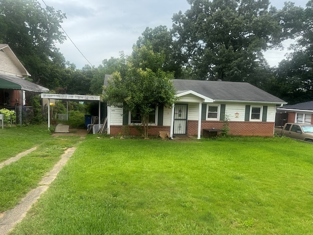322 48th St, Columbus, GA 31904 - view of front of home with brick siding and driveway
