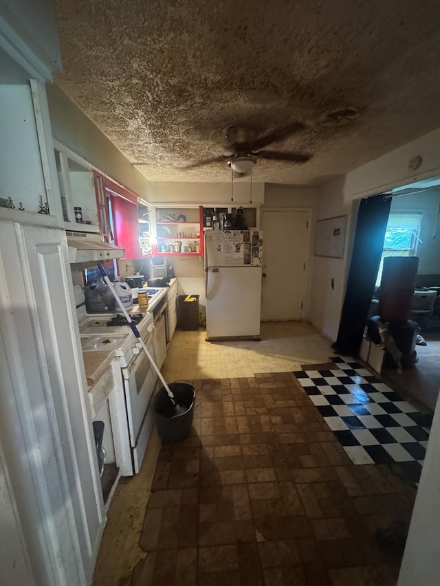 322 48th St, Columbus, GA 31904 - kitchen with white appliances, ceiling fan, under cabinet range hood, and light flooring