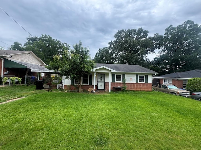 322 48th St, Columbus, GA 31904 - view of front of house featuring brick siding and a front lawn