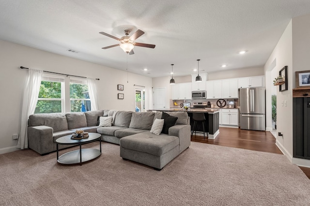 10 Red Maple St, Phenix City, AL 36869 - living area featuring ceiling fan, recessed lighting, dark wood finished floors, and dark carpet