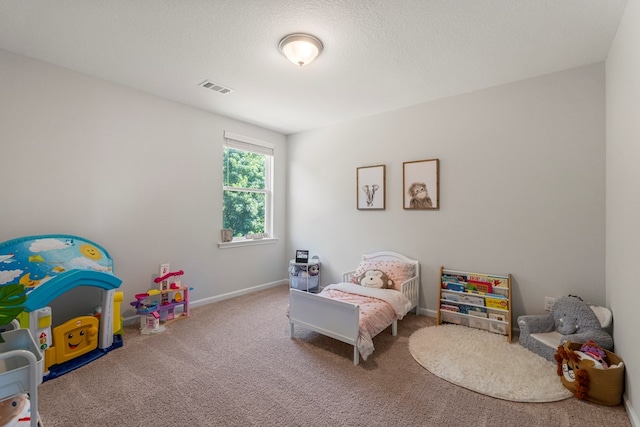 10 Red Maple St, Phenix City, AL 36869 - carpeted bedroom featuring baseboards