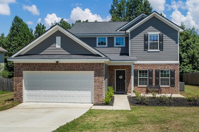 10 Red Maple St, Phenix City, AL 36869 - view of front of property featuring brick siding, driveway, and an attached garage