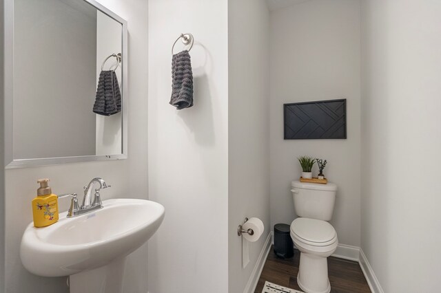 10 Red Maple St, Phenix City, AL 36869 - bathroom featuring wood finished floors and toilet