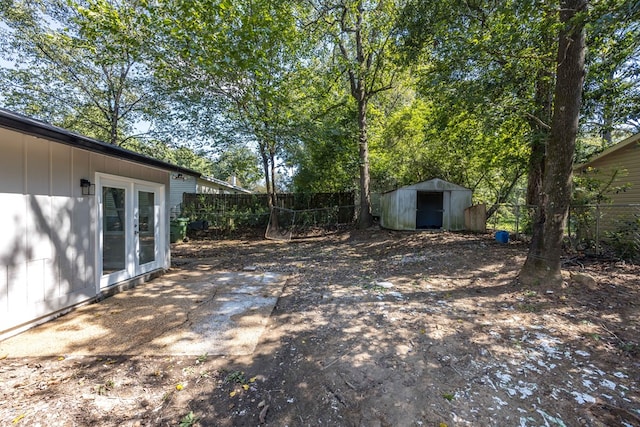 view of yard with a storage unit