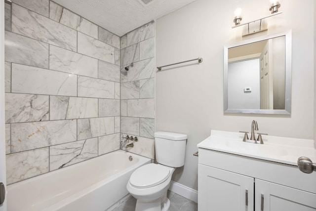 full bathroom with toilet, vanity, a textured ceiling, and tiled shower / bath