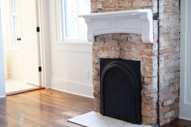 details with hardwood / wood-style flooring