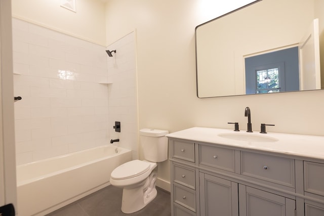 full bathroom featuring tile patterned floors, vanity, toilet, and tiled shower / bath