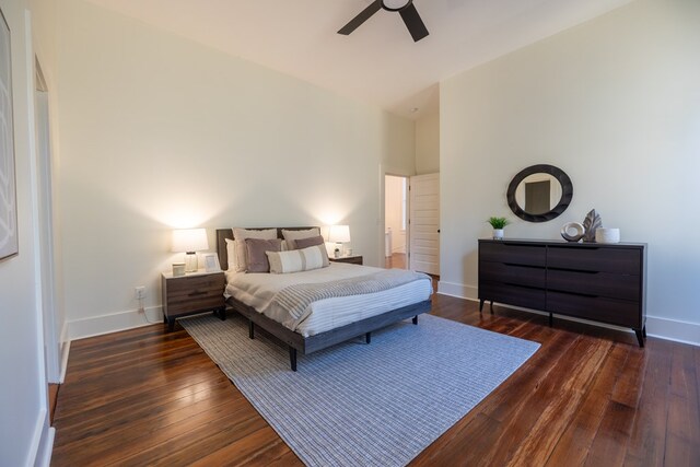 bedroom featuring dark hardwood / wood-style flooring and ceiling fan