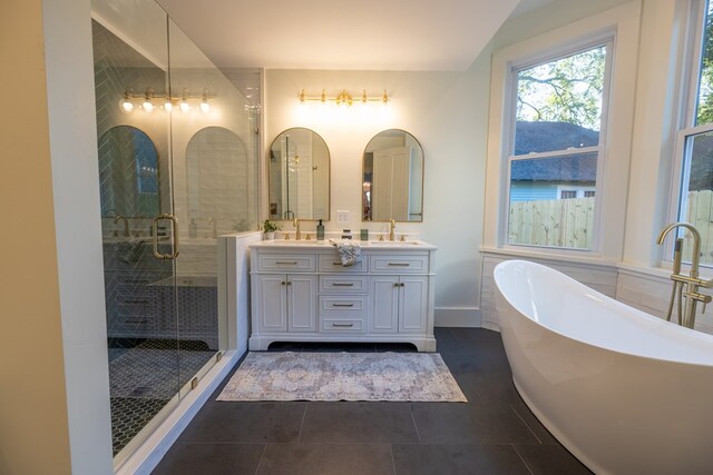 bathroom with vanity, tile patterned floors, and independent shower and bath