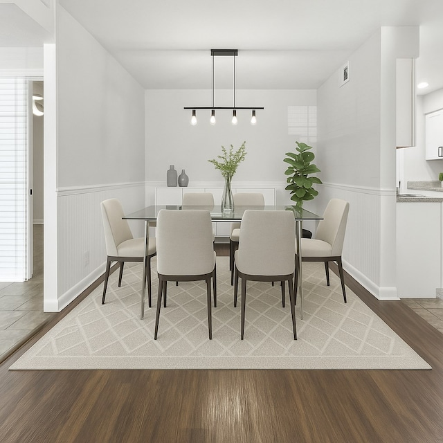 813 Wright Dr, Columbus, GA 31907 - dining space featuring a wainscoted wall and wood finished floors