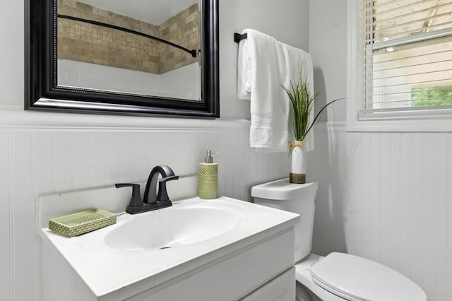 813 Wright Dr, Columbus, GA 31907 - full bathroom featuring vanity, a wainscoted wall, and a shower