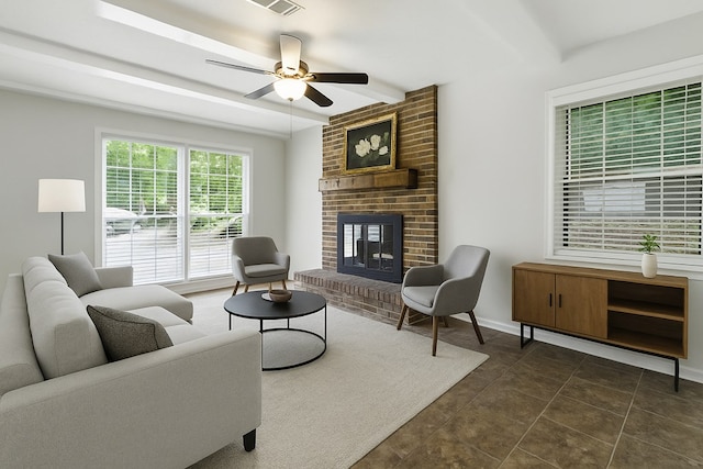 813 Wright Dr, Columbus, GA 31907 - living area featuring ceiling fan, a fireplace, and beam ceiling