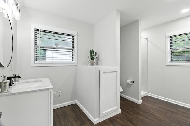 813 Wright Dr, Columbus, GA 31907 - full bath featuring wood finished floors, vanity, a shower, and recessed lighting