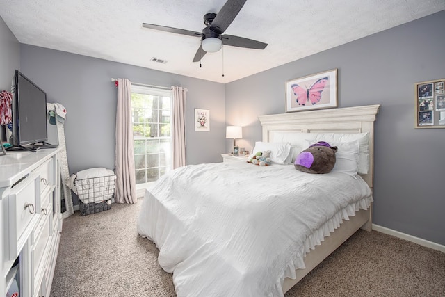 6909 Trapper Way, Midland, GA 31820 - bedroom featuring light colored carpet, a ceiling fan, and a textured ceiling