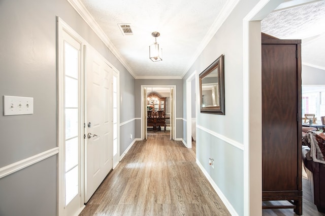 6909 Trapper Way, Midland, GA 31820 - corridor featuring ornamental molding and light wood-type flooring