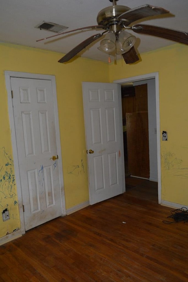 5137 Burbank St, Columbus, GA 31907 - unfurnished bedroom with wood finished floors and ceiling fan
