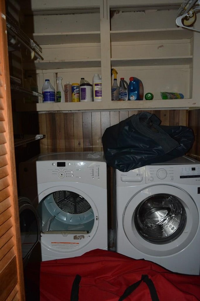 5137 Burbank St, Columbus, GA 31907 - laundry room featuring washer and clothes dryer and wooden walls