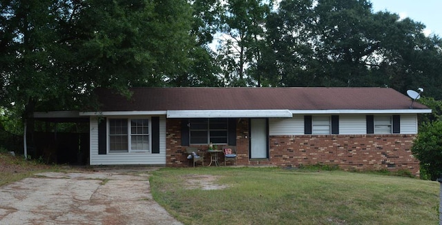 5137 Burbank St, Columbus, GA 31907 - single story home with brick siding, a front yard, driveway, and an attached carport